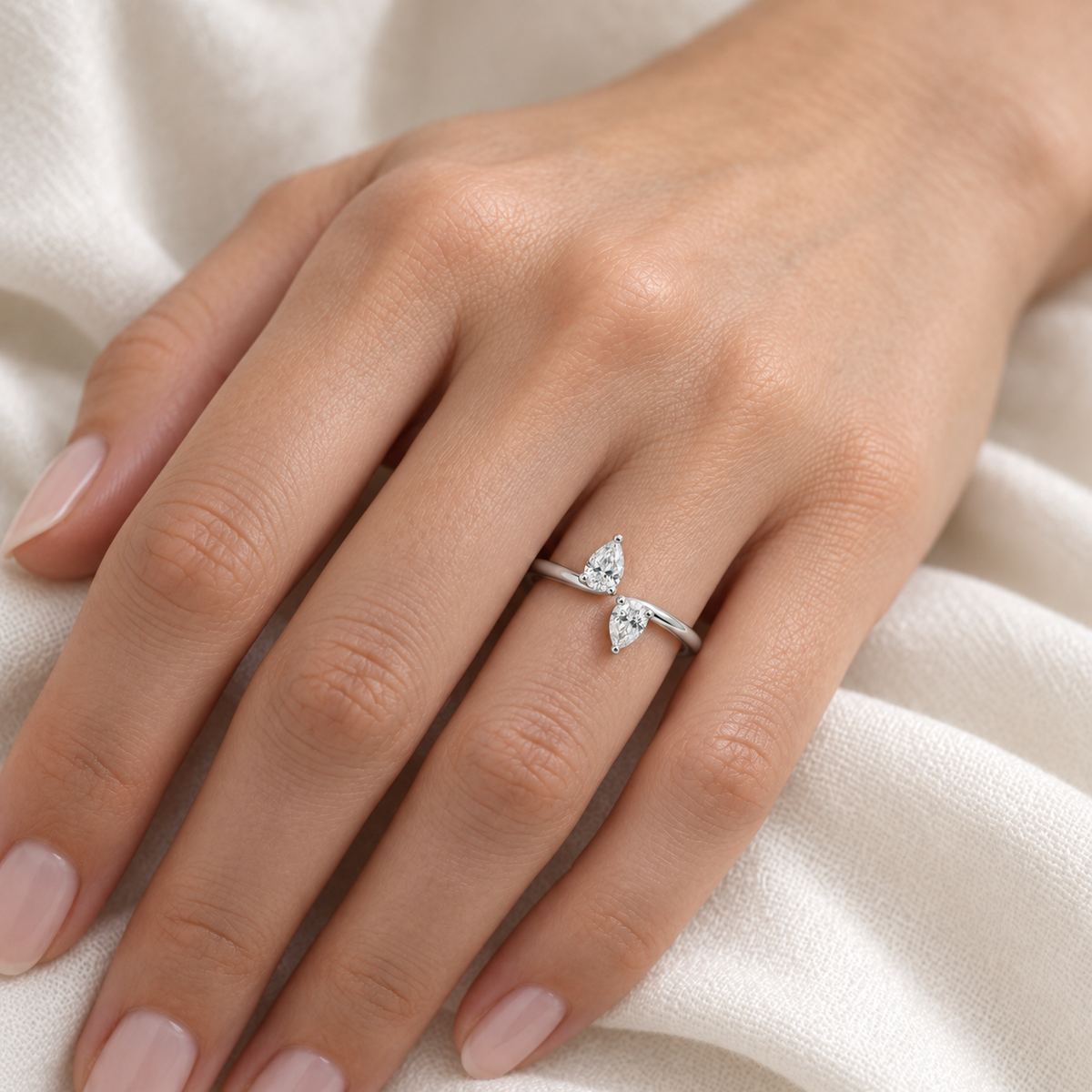 [metal:all] Maribel Pear Duo Ring — worn — Human-worn styling illustration [catalog-v4]