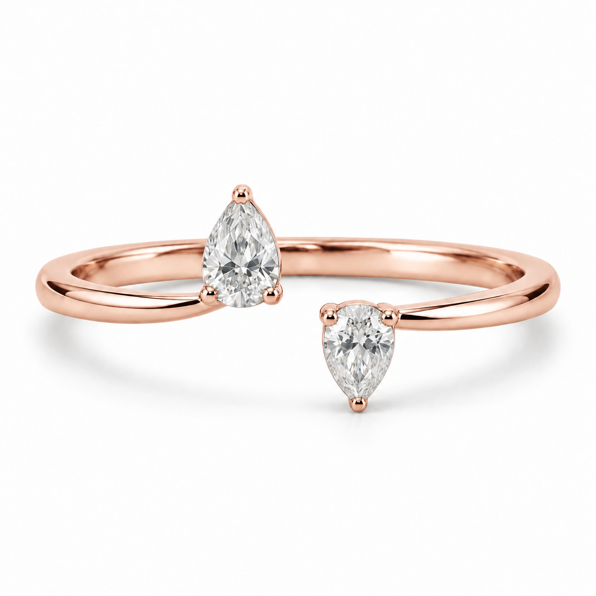 [metal:rose-gold] Maribel Pear Duo Ring — front — slender open polished ring with two modest pear diamonds at opposing tips, one pear points up other down, front view [catalog-v4]