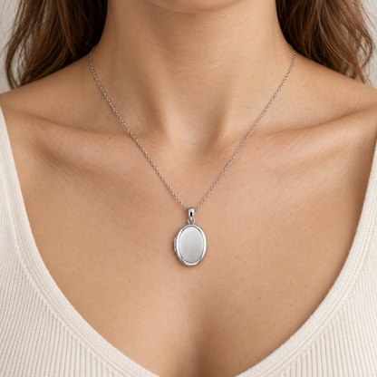 [metal:all] Meliora Oval Locket Necklace — worn — Human-worn styling illustration [catalog-v4]