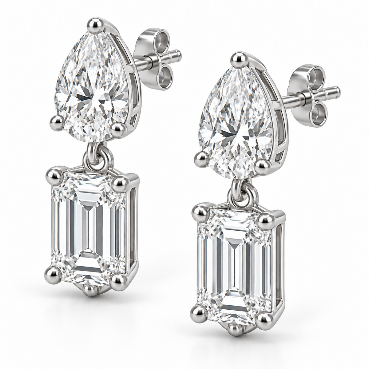 [metal:white-gold] Mirabelle Toi et Moi Drops — three-quarter — Oblique view showing articulated baskets and butterfly backs [catalog-v4]