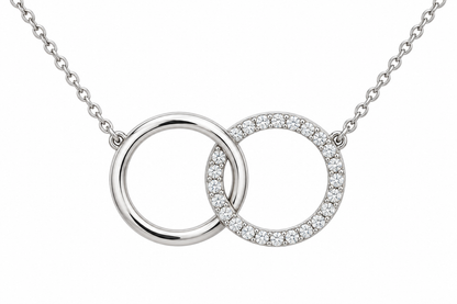 [metal:white-gold] Mirelle Double Circle Necklace — front — two small interlocking circular pendants one plain polished and one fine round-diamond pave, fine chain attached at upper outer sides, front view [catalog-v4]