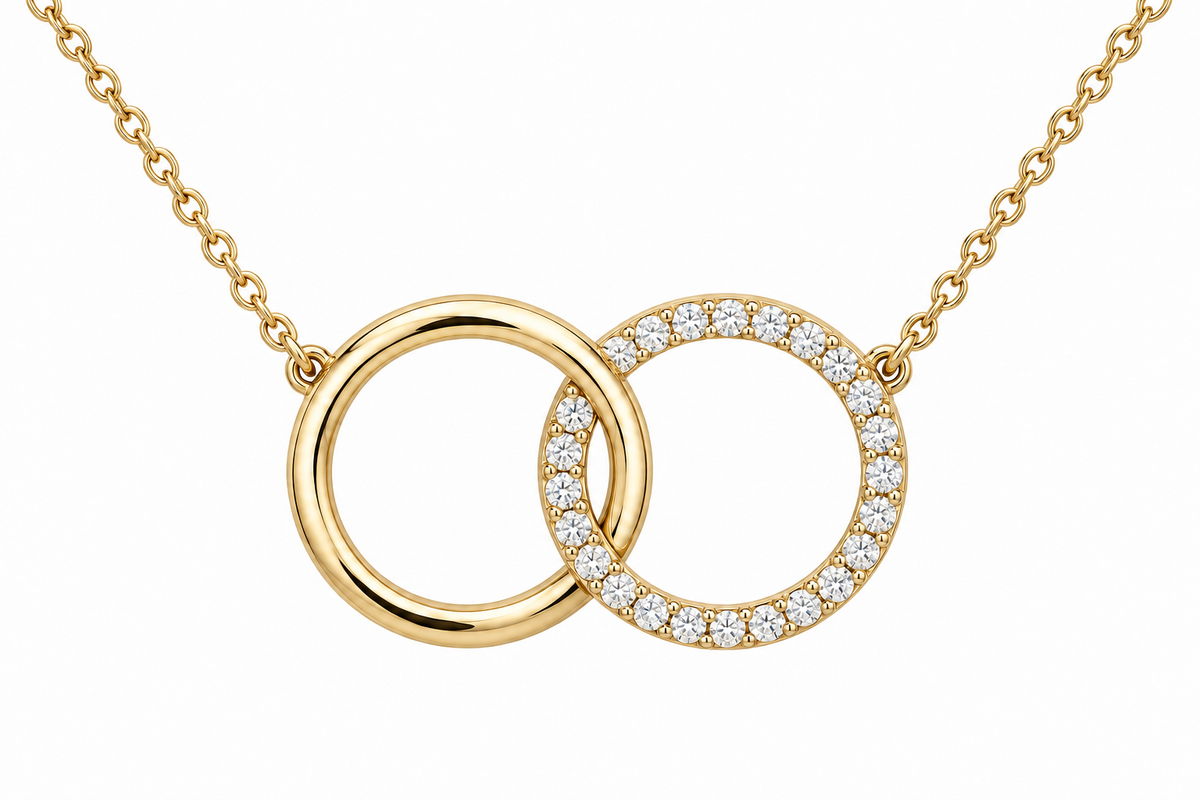 [metal:yellow-gold] Mirelle Double Circle Necklace — front — two small interlocking circular pendants one plain polished and one fine round-diamond pave, fine chain attached at upper outer sides, front view [catalog-v4]