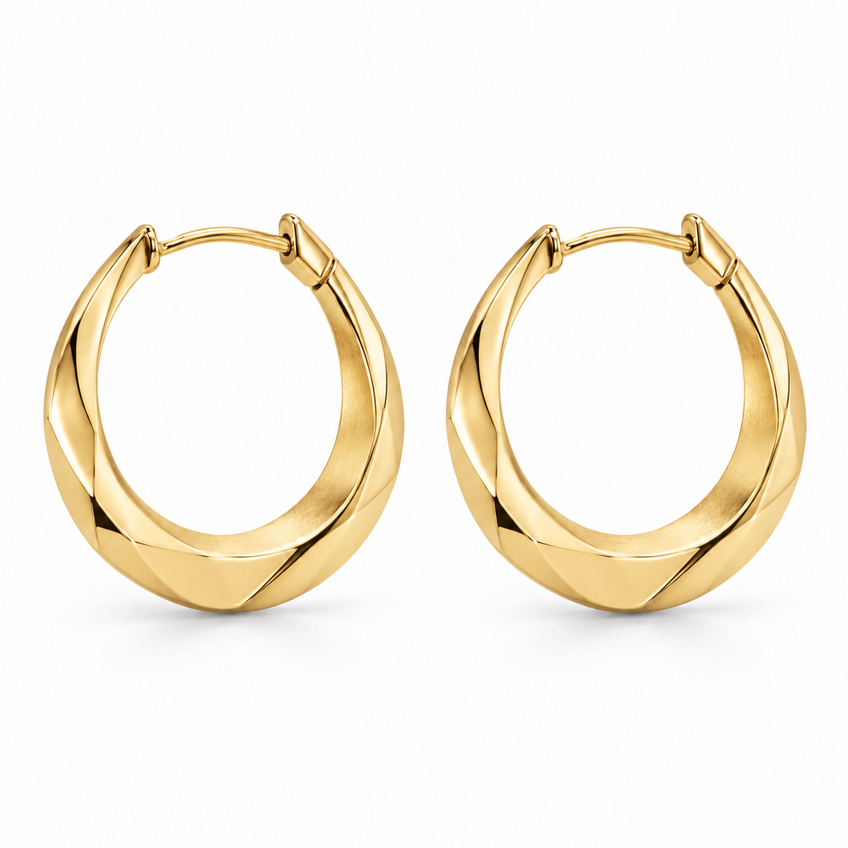 [metal:yellow-gold] Naverie Facet Crescent Hoops — front — Matching pair of small hinged crescent hoops with solid triangular faceted metal cross-section, narrow at ends and broader along lower front arc. Polished exterior facets, satin inner facet, hinged rear latch. No stones, no open front gap when closed. [catalog-v4]