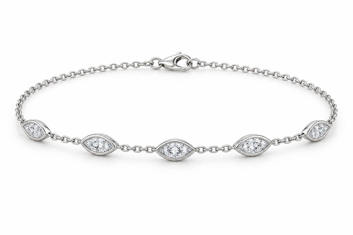 [metal:white-gold] Nerida Marquise Station Bracelet — front — fine cable-chain bracelet with exactly five spaced east-west marquise diamond bezel stations, front view [catalog-v4]