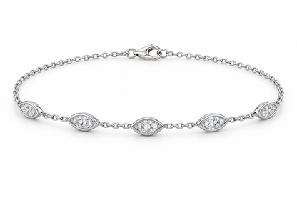 [metal:white-gold] Nerida Marquise Station Bracelet — front — fine cable-chain bracelet with exactly five spaced east-west marquise diamond bezel stations, front view [catalog-v4]