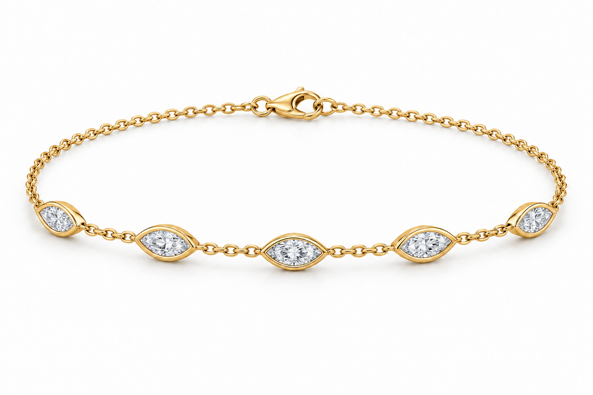 [metal:yellow-gold] Nerida Marquise Station Bracelet — front — fine cable-chain bracelet with exactly five spaced east-west marquise diamond bezel stations, front view [catalog-v4]