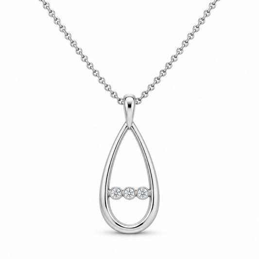 [metal:white-gold] Nymelle Raindrop Bridge Pendant — front — One vertical open polished elongated teardrop frame, with exactly three tiny round diamonds flush-set in a short horizontal metal bridge crossing its lower third. Fine chain attached to small upper bail. Not a diamond teardrop centre. [catalog-v4]; any chain shown is an optional styling accessory