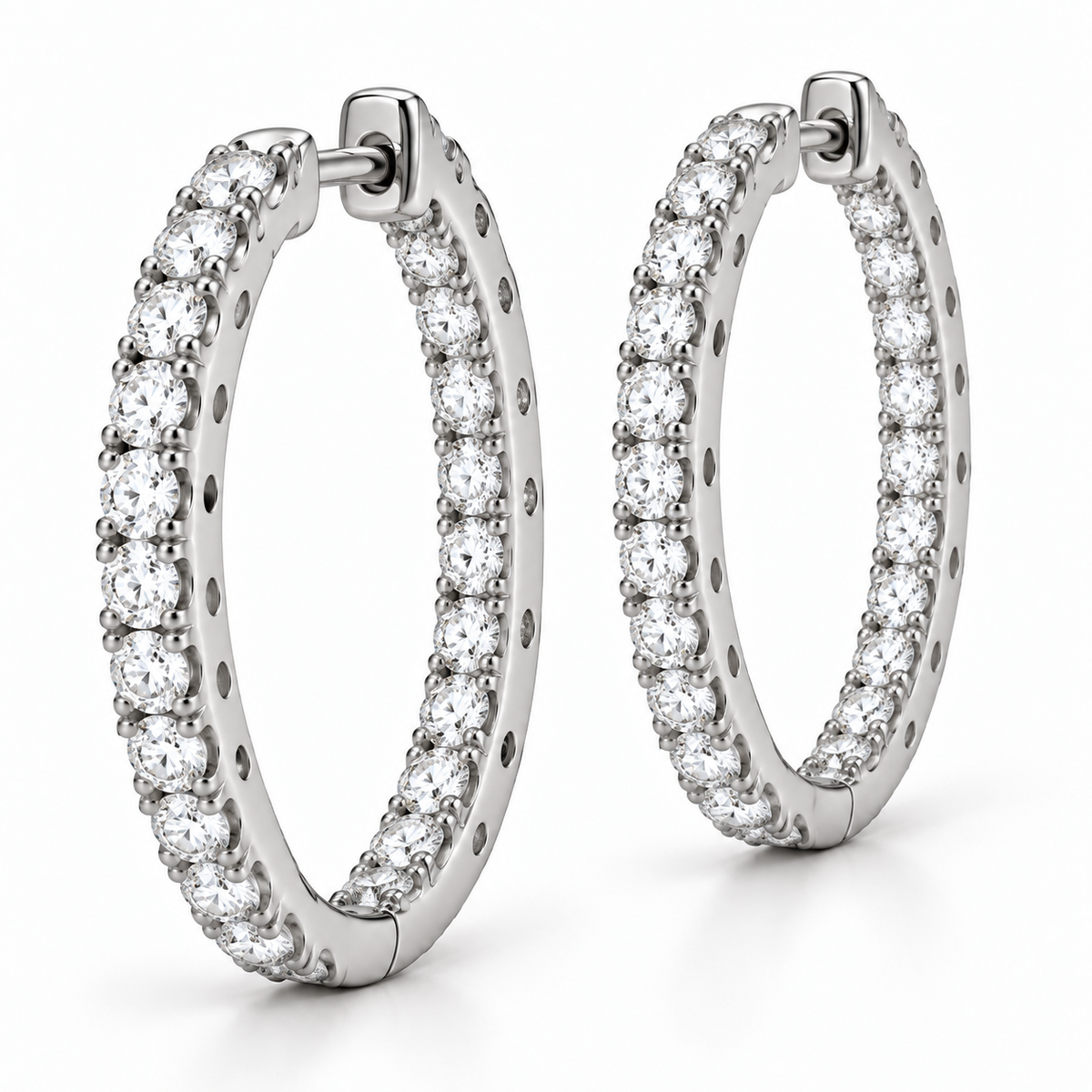 [metal:white-gold] Ondine Pavé Hoops — three-quarter — Oblique view showing side walls and clasp construction [catalog-v4]