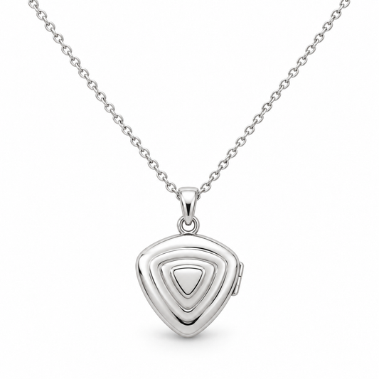 [metal:white-gold] Orelisse Ripple Locket Pendant — front — One small closed rounded-triangle locket with three shallow concentric rounded-triangle ripples on its front, smooth back, discreet hinge on right edge and a small simple round bail. Fine cable chain. No engraving or stones. [catalog-v4]; any chain shown is an optional styling accessory