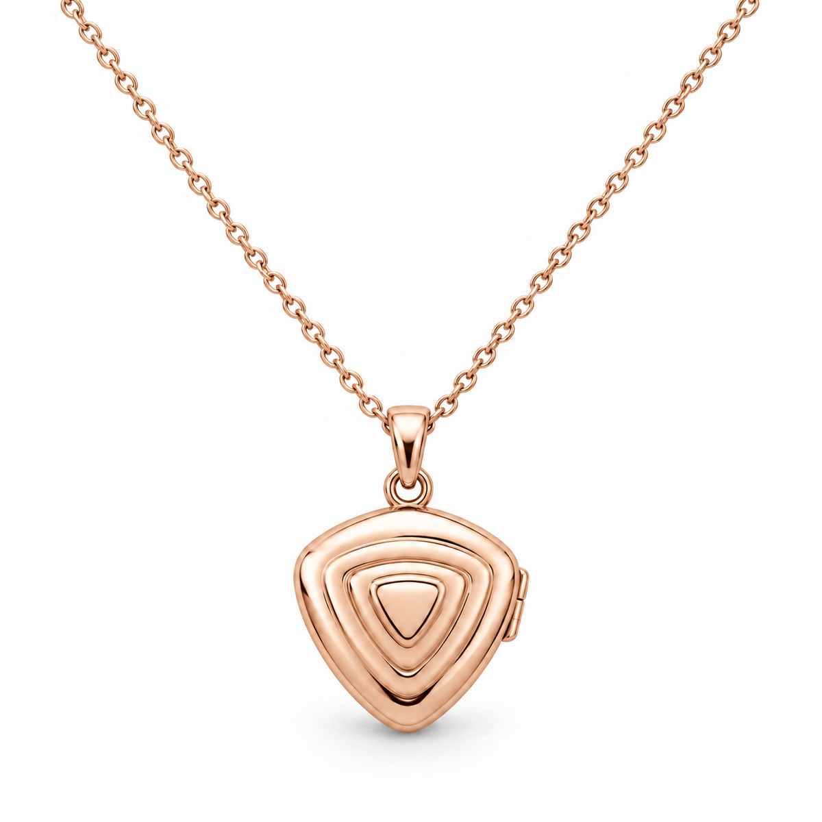 [metal:rose-gold] Orelisse Ripple Locket Necklace — front — One small closed rounded-triangle locket with three shallow concentric rounded-triangle ripples on its front, smooth back, discreet hinge on right edge and a small simple round bail. Fine cable chain. No engraving or stones. [catalog-v4]