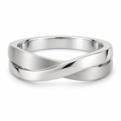 [metal:white-gold] Orielle Ribbon Crossover Ring — front — two flat white gold ribbons crossing asymmetrically, one satin one polished, sculptural low-profile crossover ring no stones, front view [catalog-v4]