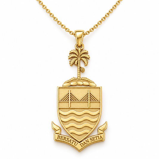 Penang Emblem Pendant — front, yellow gold; any chain shown is an optional styling accessory