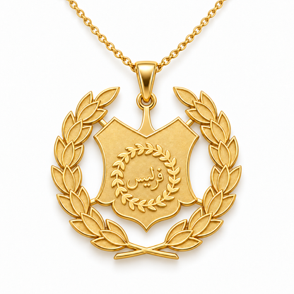 Perlis Emblem Pendant — front, yellow gold; any chain shown is an optional styling accessory