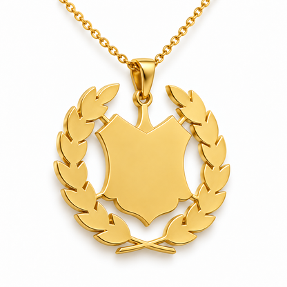 Perlis Emblem Pendant — plain reverse angle, yellow gold; any chain shown is an optional styling accessory