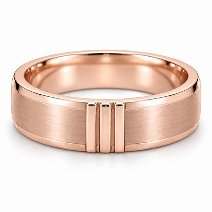[metal:rose-gold] Rhydian Offset-Pillar Band — front — Mens closed continuous flat 6 mm wedding band. Three short raised polished vertical bars grouped on front third of a satin flat surface, separated by satin gaps. Rounded polished outer edges, smooth circular comfort-fit interior, plain underside. No stones. [catalog-v4]