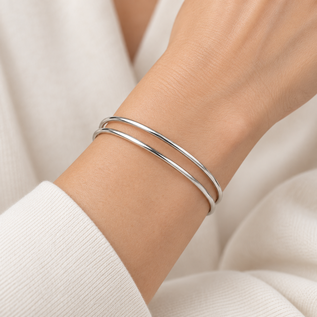 [metal:all] Ruelle Double-Rail Cuff — worn — Human-worn styling illustration [catalog-v4]