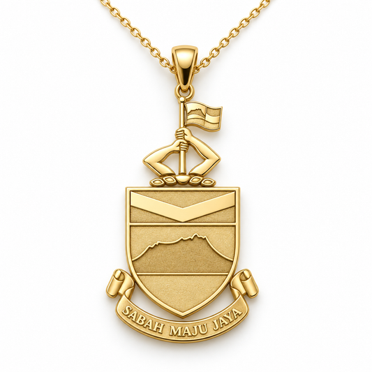 Sabah Emblem Pendant — front, yellow gold; any chain shown is an optional styling accessory