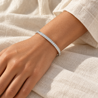 [metal:all] Solenne Bangle — worn — Human-worn styling illustration [catalog-v4]