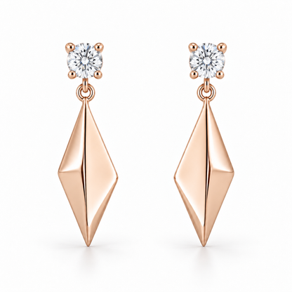 [metal:rose-gold] Solivelle Kite Drop Earrings — front — Matching pair: each earring has one small round diamond stud in a four-claw basket, one tiny articulating jump ring and one solid polished asymmetric kite-shaped metal drop with a single folded central ridge. No diamonds on kite. Straight post and butterfly back. [catalog-v4]