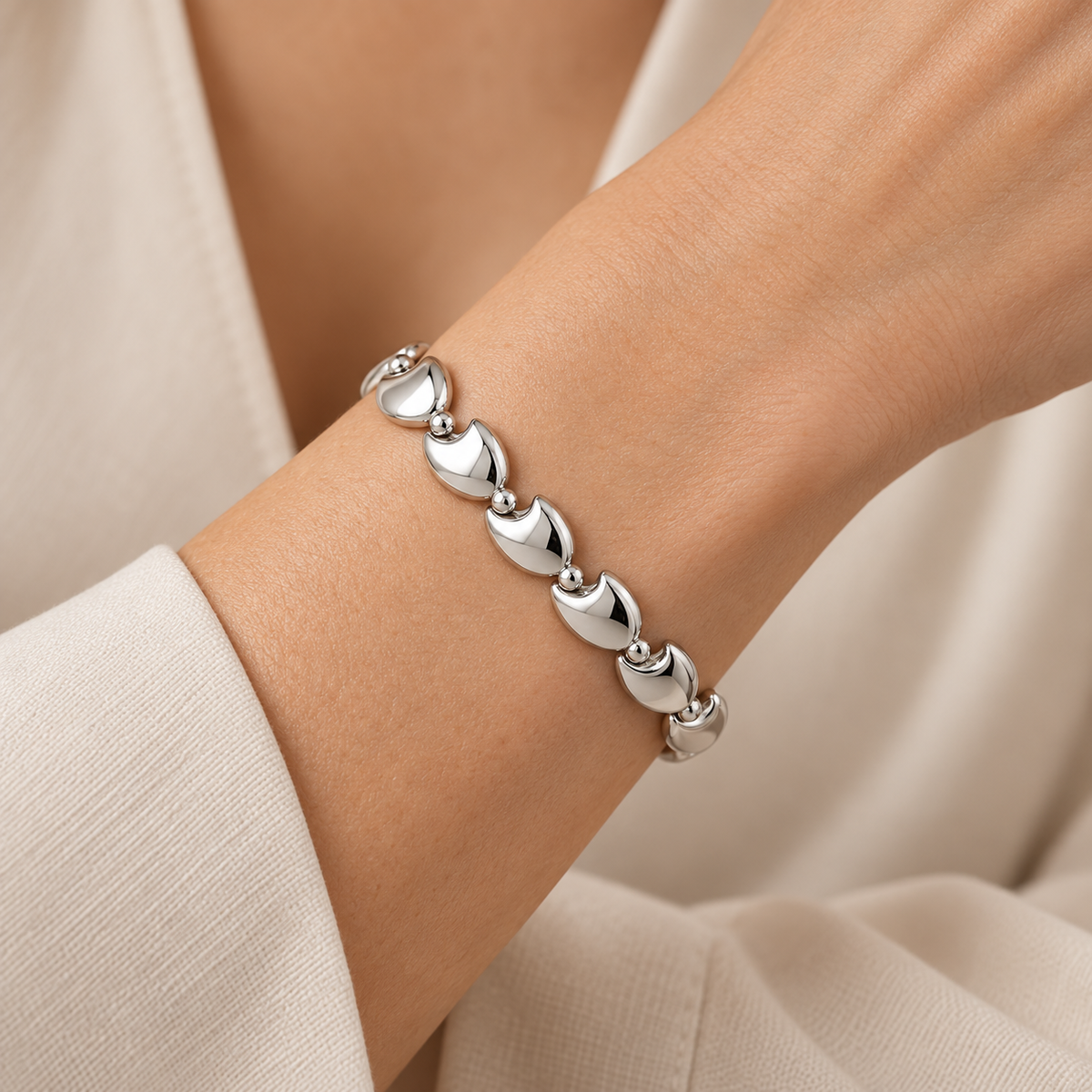 [metal:white-gold] Tavelle Crescent-Link Bracelet — worn — Same design shown worn [catalog-v4]
