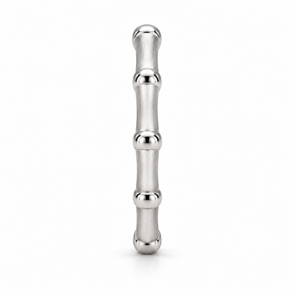[metal:white-gold] Thalia Bamboo Band — side-profile — slender bamboo-inspired satin rounded band with evenly spaced polished raised nodes, no stones, side-profile view [catalog-v4]