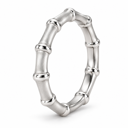 [metal:white-gold] Thalia Bamboo Band — three-quarter — slender bamboo-inspired satin rounded band with evenly spaced polished raised nodes, no stones, three-quarter view [catalog-v4]