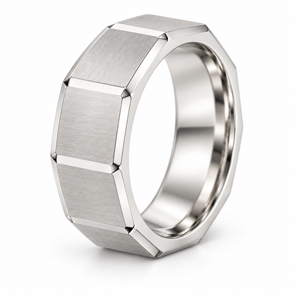 [metal:white-gold] Valentin Octagonal Band — three-quarter — men's broad octagonal outer profile band with eight large flat satin panels and narrow polished bevel edges, circular bore no stones, three-quarter view [catalog-v4]