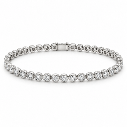 [metal:white-gold] Vesper Bezel Tennis Bracelet — front — continuous tennis bracelet of small round diamonds in separate smooth circular bezels, front view [catalog-v4]