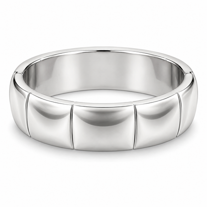 [metal:white-gold] Veyron Contour-Tile Band — front — Mens closed continuous 6 mm band with six broad smooth polished shallow saddle-shaped outer panels, each separated by a very fine incised straight seam. Each saddle panel subtly concave lengthwise, rounded borders, unbroken circular inner bore. No stones, no holes, no braid. [catalog-v4]