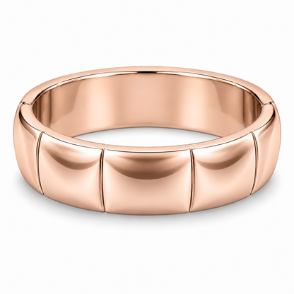 [metal:rose-gold] Veyron Contour-Tile Band — front — Mens closed continuous 6 mm band with six broad smooth polished shallow saddle-shaped outer panels, each separated by a very fine incised straight seam. Each saddle panel subtly concave lengthwise, rounded borders, unbroken circular inner bore. No stones, no holes, no braid. [catalog-v4]