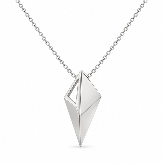 [metal:white-gold] Virelia Folded Sail Pendant — front — One asymmetric solid folded triangular metal sail pendant, three crisp planar facets and one narrow open triangular aperture near the upper left edge. Single small hidden bail at top, fine cable chain, no stones. [catalog-v4]; any chain shown is an optional styling accessory