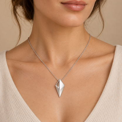 [metal:white-gold] Virelia Folded Sail Necklace — worn — Same design shown worn [catalog-v4]