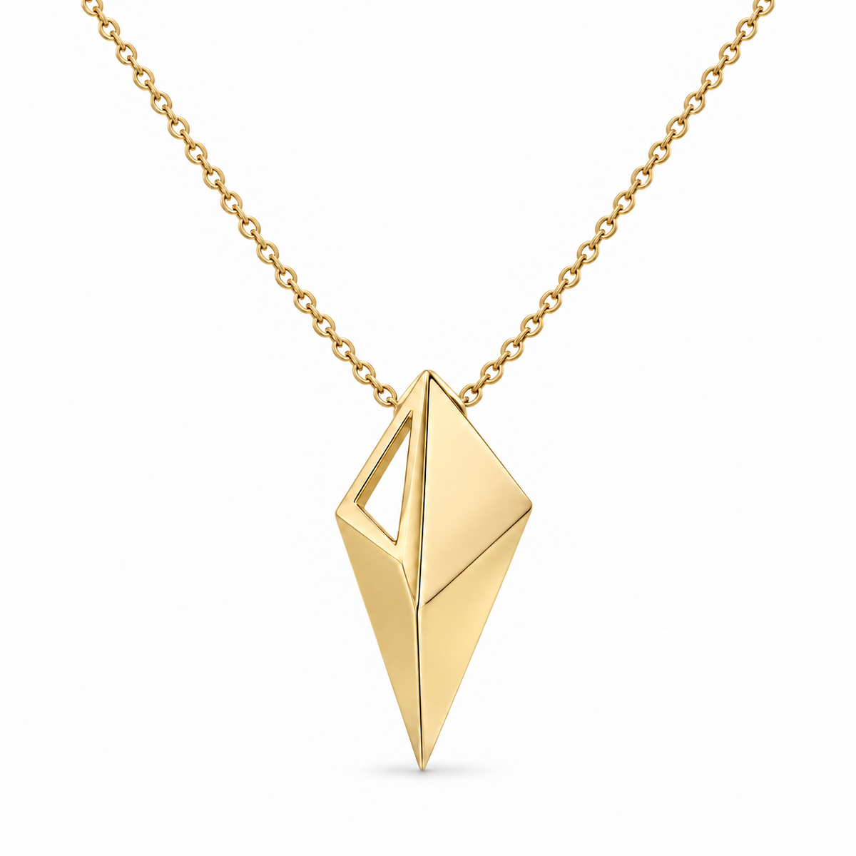 [metal:yellow-gold] Virelia Folded Sail Necklace — front — One asymmetric solid folded triangular metal sail pendant, three crisp planar facets and one narrow open triangular aperture near the upper left edge. Single small hidden bail at top, fine cable chain, no stones. [catalog-v4]