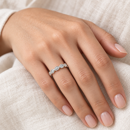 [metal:all] Yselle Marquise Bezel Eternity Ring — worn — Human-worn styling illustration [catalog-v4]
