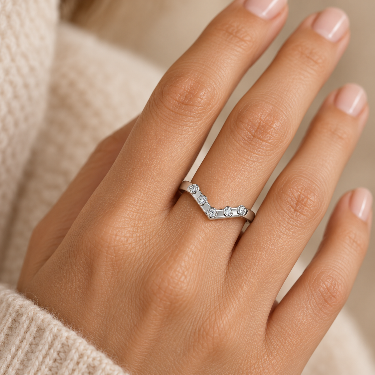 [metal:white-gold] Zerielle Five-Bezel Chevron Band — worn — Same design shown worn [catalog-v4]