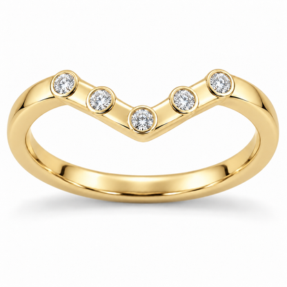 [metal:yellow-gold] Zerielle Five-Bezel Chevron Band — front — Womens closed continuous narrow chevron nesting band. Exactly five small round diamonds in five individual full circular bezels spaced evenly along the shallow V top, central bezel at V point and two on each arm. Plain smooth lower shank, no extra stones. [catalog-v4]